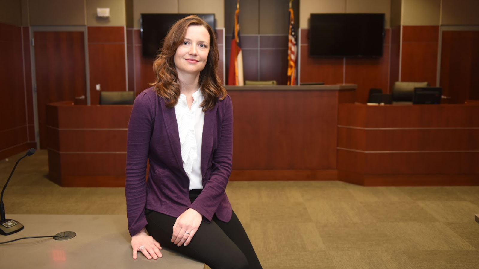 Dr. Sarah Desmarais sitting in courtroom