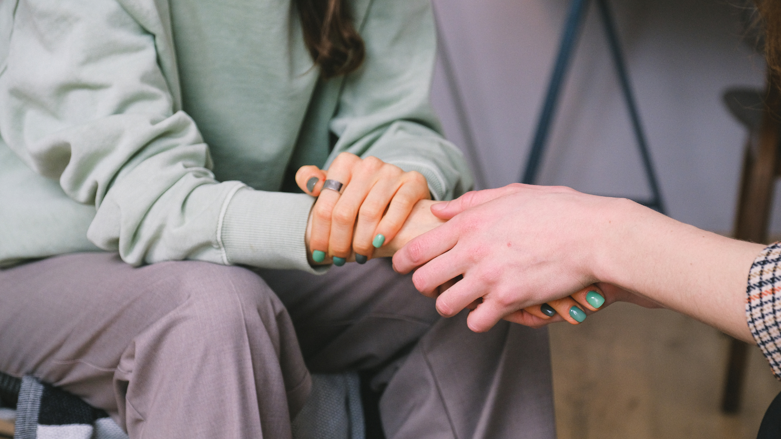 holding hands in support